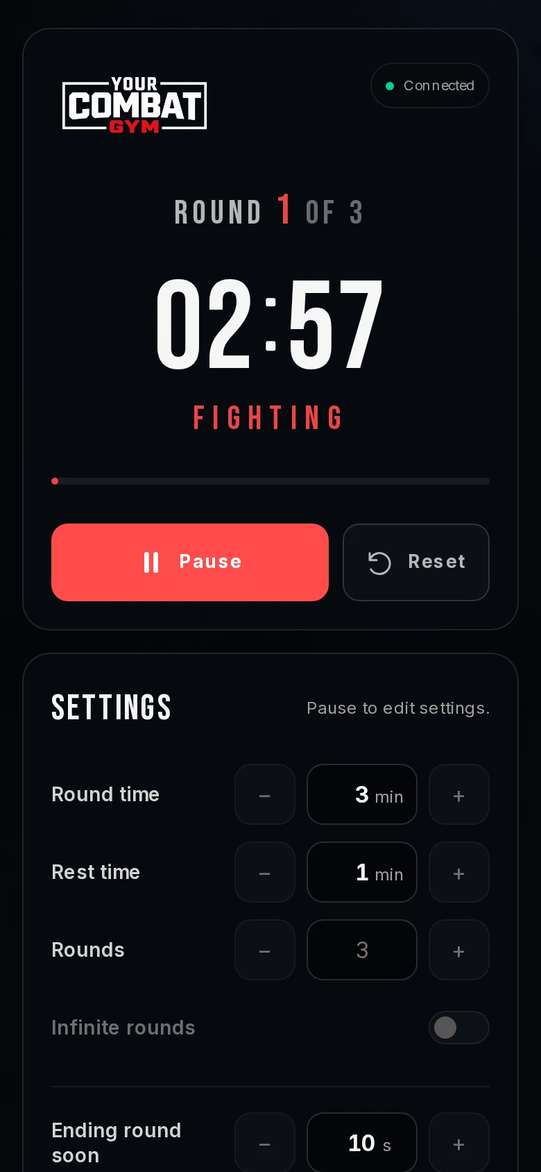 The matching phone controller showing Your Combat Gym branding, pause and reset controls, and timer settings